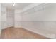 Spacious walk-in closet featuring white wire shelving and carpeted floor at 3004 Fallondale Rd, Waxhaw, NC 28173
