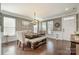 Formal dining room with large table, decorative accents, and plenty of natural light at 3004 Fallondale Rd, Waxhaw, NC 28173