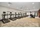 Well-equipped community gym with treadmills, ellipticals, and a stair climber, offering a variety of workout options at 3004 Fallondale Rd, Waxhaw, NC 28173