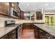 Beautiful kitchen featuring granite countertops, stainless steel appliances, and ample cabinet space at 3004 Fallondale Rd, Waxhaw, NC 28173