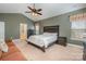 Spacious main bedroom features high vaulted ceiling, neutral carpet, and ensuite bath access at 3004 Fallondale Rd, Waxhaw, NC 28173