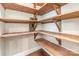 Walk-in pantry with wooden shelving at 3004 Fallondale Rd, Waxhaw, NC 28173