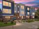 Stylish townhomes with colorful exteriors and manicured lawns, creating curb appeal at 3904 Craig Ave, Charlotte, NC 28211
