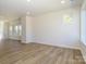 Spacious living room with hardwood floors and recessed lighting at 3904 Craig Ave, Charlotte, NC 28211
