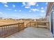 Back porch with wooden deck overlooking a large yard at 451 Lookout Dam Rd, Statesville, NC 28625