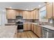 Well-appointed kitchen showcasing modern appliances, granite counters, and stylish cabinetry at 451 Lookout Dam Rd, Statesville, NC 28625