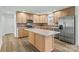 Beautiful kitchen with a large island, wood cabinets, and stainless steel appliances at 451 Lookout Dam Rd, Statesville, NC 28625