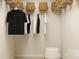 Well-organized closet space with hanging rods, shelving, and a stool for convenience at 4555 Dusty Orchard Rd, Kannapolis, NC 28081