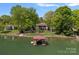 Stunning waterfront estate with a private dock and lush landscaping at 4786 Heather Ln, Denver, NC 28037