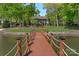 Expansive backyard with a private dock, gazebo, and lush landscaping, offering serene lake access at 4786 Heather Ln, Denver, NC 28037