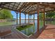 Property includes a private boat slip with covered storage, perfect for lake enthusiasts at 4786 Heather Ln, Denver, NC 28037
