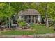 Beautiful lakefront home featuring a two-story porch and inviting outdoor spaces at 4786 Heather Ln, Denver, NC 28037