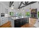 Open-concept kitchen featuring an island, granite countertops and stainless steel appliances at 4786 Heather Ln, Denver, NC 28037