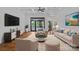 Bright living room featuring stylish furniture and a stunning lake view at 4786 Heather Ln, Denver, NC 28037
