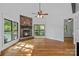 Living room with fireplace, hardwood floors, and views of the lake at 4786 Heather Ln, Denver, NC 28037