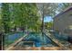 Luxury pool with glass surround offers stunning lake views at 4786 Heather Ln, Denver, NC 28037
