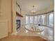 Bright bathroom features a jacuzzi tub, fireplace and elegant chandelier at 503 Stuart Rdg, Cramerton, NC 28032