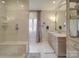 Bright bathroom with a glass shower, marble floors, and vanity at 503 Stuart Rdg, Cramerton, NC 28032