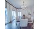 Bright dining room featuring hardwood floors, modern lighting, and large windows with lots of natural light at 503 Stuart Rdg, Cramerton, NC 28032