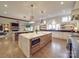 Spacious kitchen with double island, hardwood floors, modern lighting and stainless steel appliances at 503 Stuart Rdg, Cramerton, NC 28032