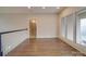 Spacious living room boasts hardwood floors and large windows at 503 Stuart Rdg, Cramerton, NC 28032