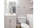Updated bathroom with a modern vanity, sink, and a white toilet at 608 E Matthews St, Matthews, NC 28105