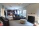Open living room with fireplace flowing into the kitchen, perfect for Gathering gatherings at 6237 Shelley Ave, Charlotte, NC 28269