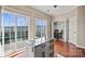 Kitchen with island, sliding doors to patio, and lots of sunlight at 9724 Walkers Glen Nw Dr, Concord, NC 28027