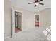 Spacious bedroom with ensuite bathroom and walk-in closet offering convenience and privacy at 9724 Walkers Glen Nw Dr, Concord, NC 28027