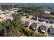 Community aerial view showcasing neighborhood layout, homes, and proximity to tennis courts and green spaces at 1029 Dali Blvd, Mount Holly, NC 28120