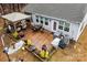 Backyard aerial view with patio area, gazebo and well-manicured lawn at 1029 Dali Blvd, Mount Holly, NC 28120