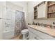Well-lit bathroom with a shower/tub combination and stylish vanity at 1029 Dali Blvd, Mount Holly, NC 28120