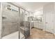 Beautiful bathroom with tiled shower stall, shower seating, and double sink vanity at 1029 Dali Blvd, Mount Holly, NC 28120