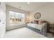 Comfortable bedroom with a daybed, neutral tones, and a large window offering natural light at 1029 Dali Blvd, Mount Holly, NC 28120