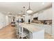 Open kitchen with a large island, stainless steel appliances, and white cabinetry at 1029 Dali Blvd, Mount Holly, NC 28120
