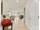 Open-concept living area featuring hardwood floors and a view of the kitchen at 1029 Dali Blvd, Mount Holly, NC 28120