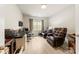 Comfortable living room space featuring hardwood flooring and a seating area at 1029 Dali Blvd, Mount Holly, NC 28120