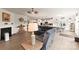 Spacious and well-lit living space with a fireplace, kitchen, and dining area at 1029 Dali Blvd, Mount Holly, NC 28120