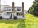 Backyard view with an air conditioning unit, fence, patio and grassy lawn at 11020 Carmel Crossing Rd, Charlotte, NC 28226