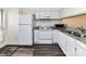 Bright kitchen featuring granite countertops, white appliances and modern fixtures at 11020 Carmel Crossing Rd, Charlotte, NC 28226