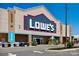 Exterior facade of a Lowe's hardware store on a bright, sunny day at 121 Jameson Park Dr # 2, Troutman, NC 28166
