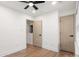 A simple room featuring hardwood floors and doors to a bathroom and closet at 130 Valley Glen Dr, Troutman, NC 28166