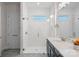 Bathroom features white tiled shower, modern vanity, and stylish flooring at 14007 Cameryn Elise Dr, Cornelius, NC 28031