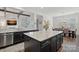 Gourmet kitchen features granite countertops, stainless appliances, and an island with seating at 14007 Cameryn Elise Dr, Cornelius, NC 28031