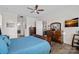 Main bedroom featuring an ensuite bathroom and generous natural light at 14007 Cameryn Elise Dr, Cornelius, NC 28031