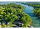 Picturesque aerial view showcasing a lakeside community with stunning waterfront properties and lush landscapes at 141 Baywatch Dr, Mooresville, NC 28117