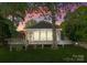 Charming home featuring a screened-in porch and beautiful sunset views at 141 Baywatch Dr, Mooresville, NC 28117