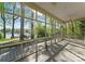 Relaxing screened porch with views of the lake, perfect for enjoying nature from the comfort of home at 141 Baywatch Dr, Mooresville, NC 28117