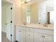 Bathroom featuring double sink vanity, quartz countertop, and a large mirror at 17021 Malone Ln, Mint Hill, NC 28227