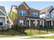A two-story home exterior with a black metal fence at 17021 Malone Ln, Mint Hill, NC 28227